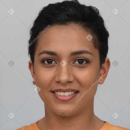 Joyful latino young-adult female with short  brown hair and brown eyes