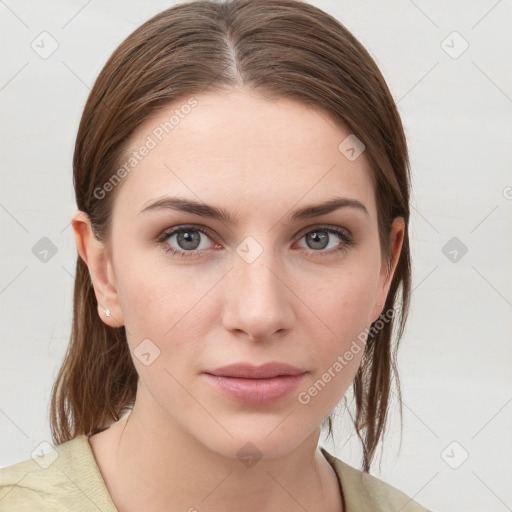 Neutral white young-adult female with medium  brown hair and grey eyes