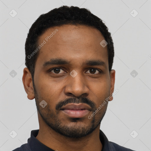 Neutral black young-adult male with short  black hair and brown eyes
