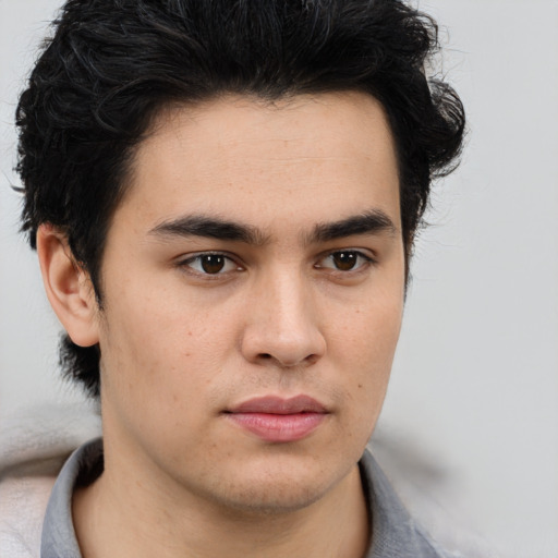 Neutral white young-adult male with short  black hair and brown eyes