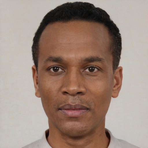 Neutral black young-adult male with short  black hair and brown eyes