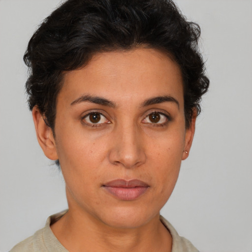 Neutral latino young-adult female with short  brown hair and brown eyes