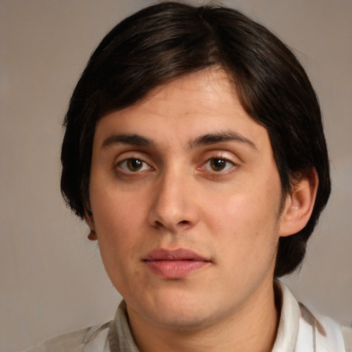 Joyful white young-adult male with medium  brown hair and brown eyes