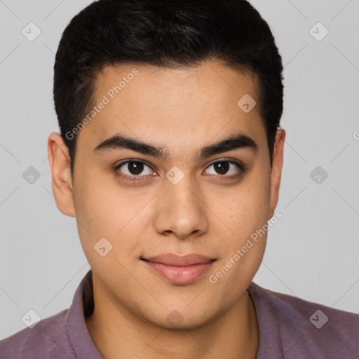 Joyful latino young-adult male with short  brown hair and brown eyes