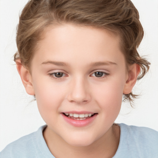 Joyful white child female with short  brown hair and grey eyes