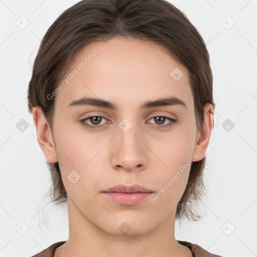 Neutral white young-adult female with medium  brown hair and brown eyes