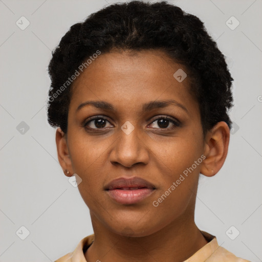 Joyful black young-adult female with short  brown hair and brown eyes