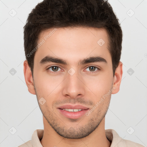 Joyful white young-adult male with short  brown hair and brown eyes