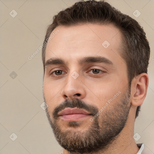 Neutral white young-adult male with short  brown hair and brown eyes