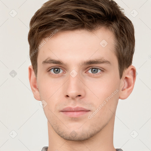 Neutral white young-adult male with short  brown hair and grey eyes