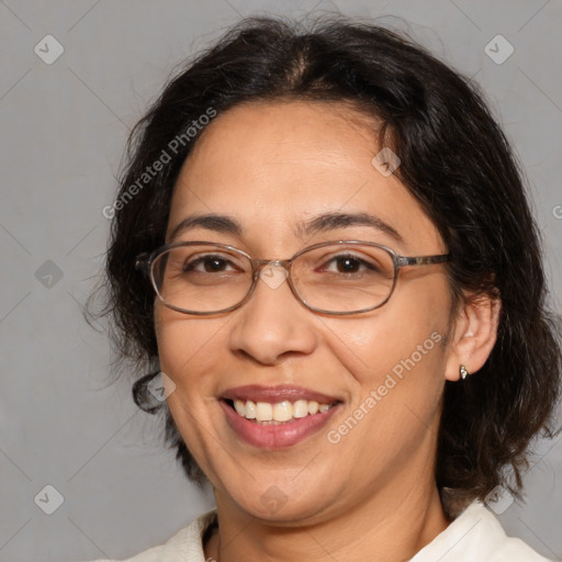 Joyful white adult female with medium  brown hair and brown eyes