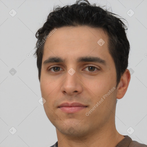 Neutral latino young-adult male with short  black hair and brown eyes