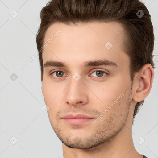 Neutral white young-adult male with short  brown hair and brown eyes