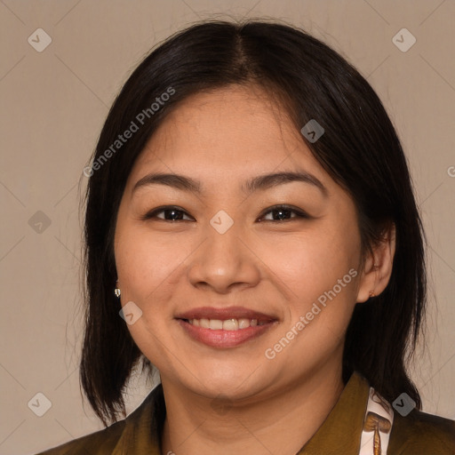 Joyful asian young-adult female with medium  brown hair and brown eyes