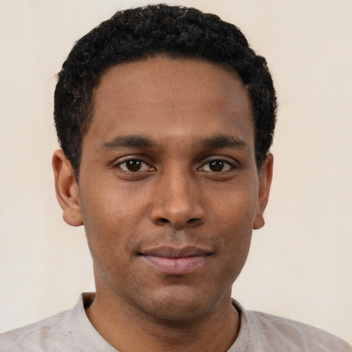 Neutral black young-adult male with short  black hair and brown eyes