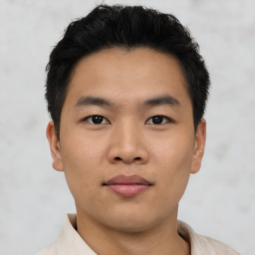 Neutral asian young-adult male with short  black hair and brown eyes
