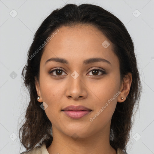 Joyful latino young-adult female with long  brown hair and brown eyes