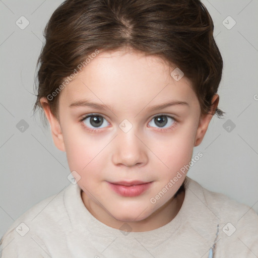 Joyful white child female with short  brown hair and brown eyes