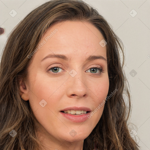 Joyful white young-adult female with long  brown hair and green eyes
