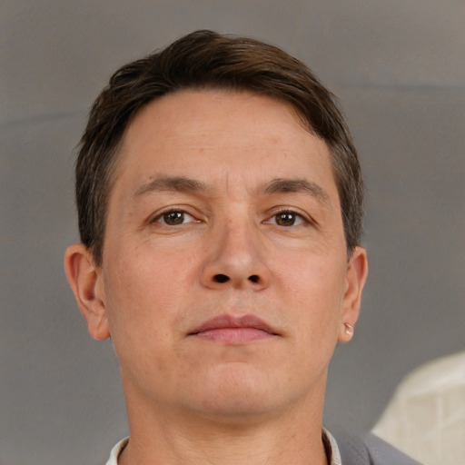 Neutral white adult male with short  brown hair and brown eyes