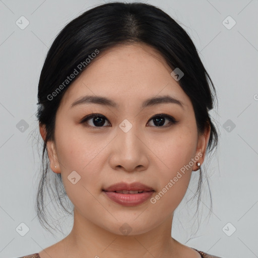 Joyful asian young-adult female with medium  black hair and brown eyes