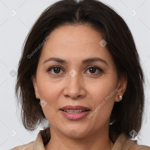 Joyful white adult female with medium  brown hair and brown eyes