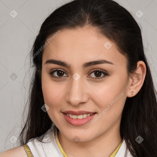 Joyful white young-adult female with long  brown hair and brown eyes