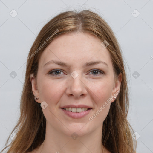 Joyful white young-adult female with long  brown hair and grey eyes