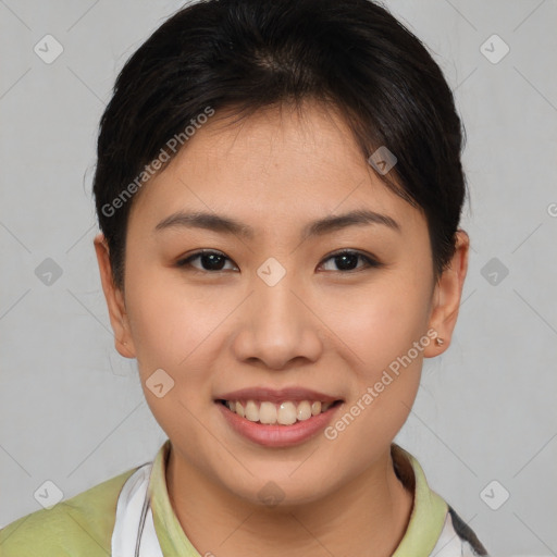 Joyful asian young-adult female with short  brown hair and brown eyes