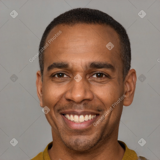 Joyful latino adult male with short  black hair and brown eyes