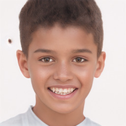 Joyful white child male with short  brown hair and brown eyes