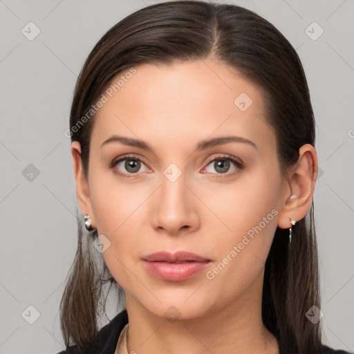 Neutral white young-adult female with long  brown hair and brown eyes