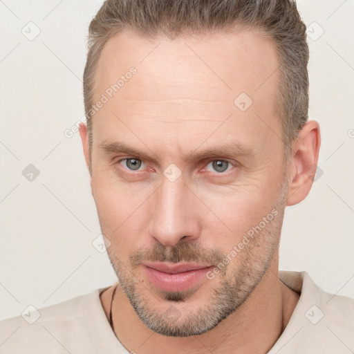 Neutral white adult male with short  brown hair and brown eyes