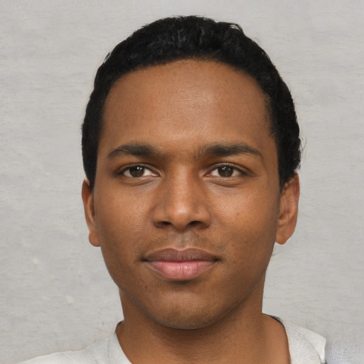 Neutral black young-adult male with short  black hair and brown eyes
