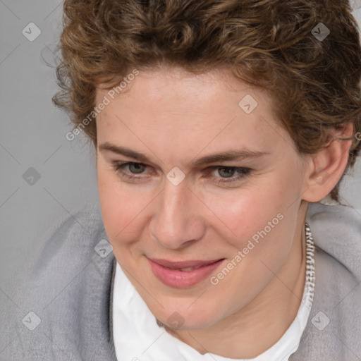 Joyful white young-adult female with medium  brown hair and blue eyes