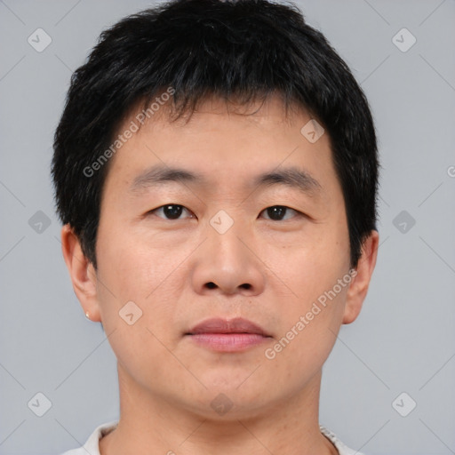 Neutral asian young-adult male with short  brown hair and brown eyes