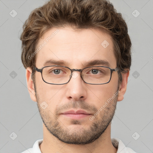 Neutral white young-adult male with short  brown hair and grey eyes