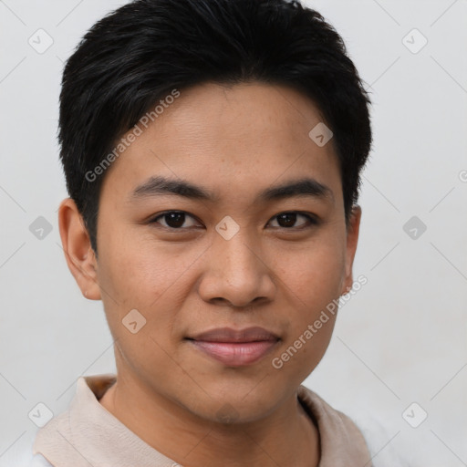 Joyful asian young-adult male with short  black hair and brown eyes