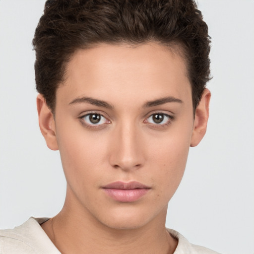 Neutral white young-adult female with short  brown hair and brown eyes