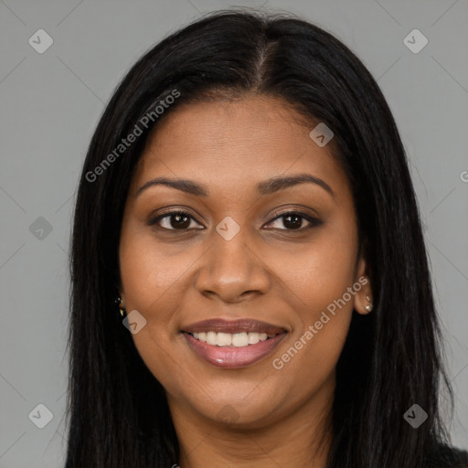 Joyful black young-adult female with long  brown hair and brown eyes