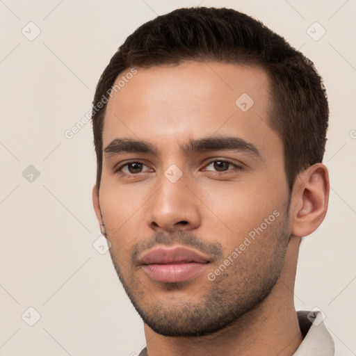 Neutral white young-adult male with short  brown hair and brown eyes