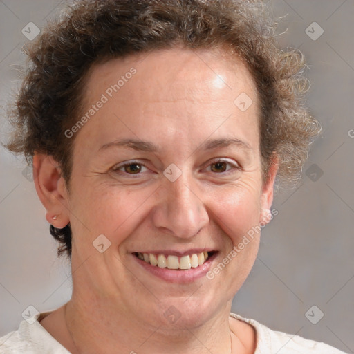 Joyful white adult female with short  brown hair and grey eyes