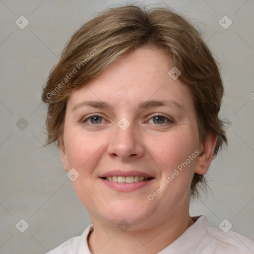 Joyful white young-adult female with medium  brown hair and blue eyes