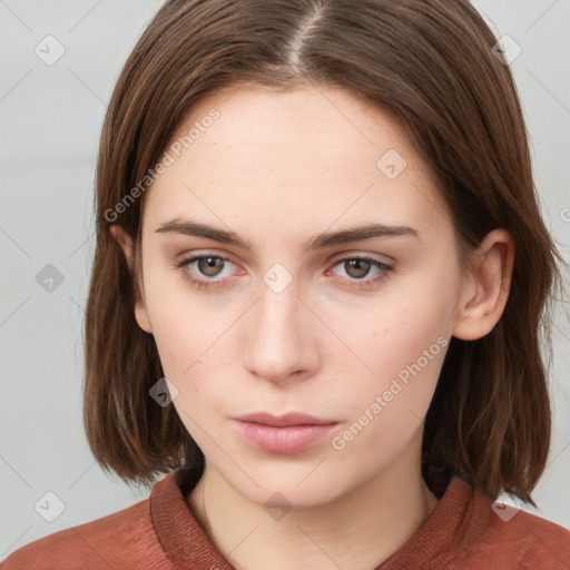 Neutral white young-adult female with medium  brown hair and grey eyes