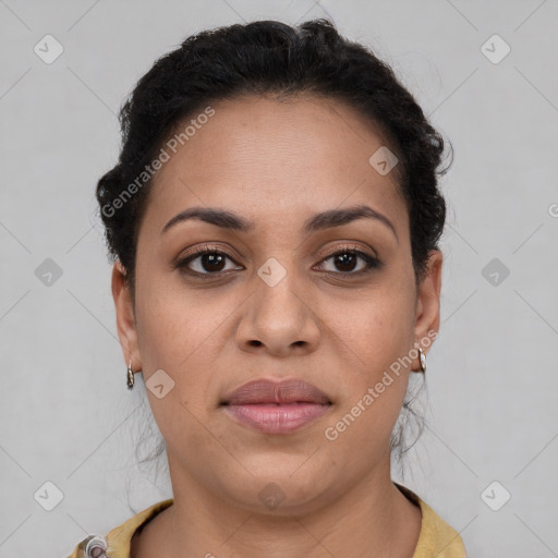 Joyful latino young-adult female with short  brown hair and brown eyes