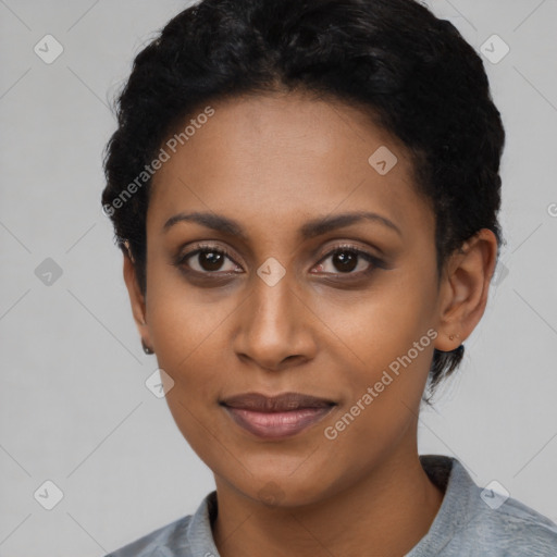 Joyful latino young-adult female with short  black hair and brown eyes