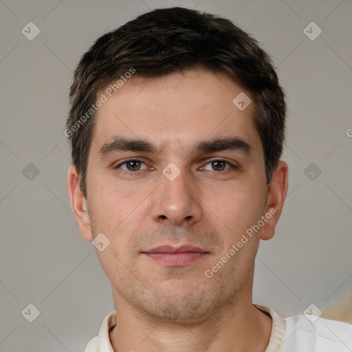 Neutral white young-adult male with short  brown hair and brown eyes