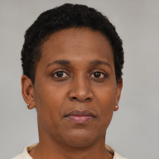 Neutral black young-adult female with short  brown hair and brown eyes