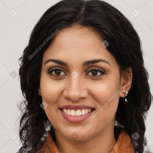 Joyful latino young-adult female with long  brown hair and brown eyes