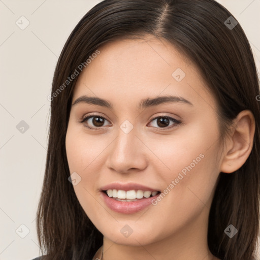 Joyful white young-adult female with long  brown hair and brown eyes